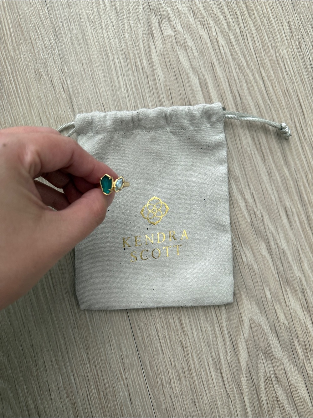 Kendra Scott Gold Ring with Emerald Green and light blue Stones